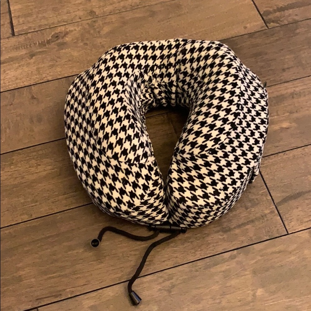 Travel pillow with storage bag